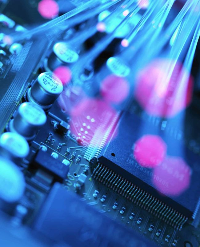 Fibre optics carrying data passing across electronic circuit board